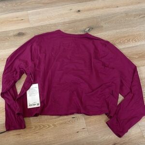lululemon sz 20 Long Sleeve Crop Tee in Fuchsia Lululemon Athletica